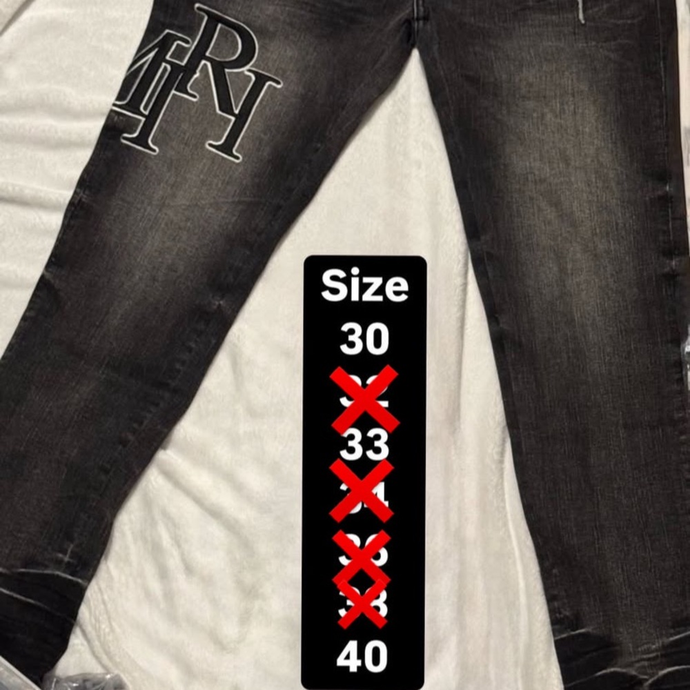 AMIRI Black Skinny Jeans with Distressed Detailing